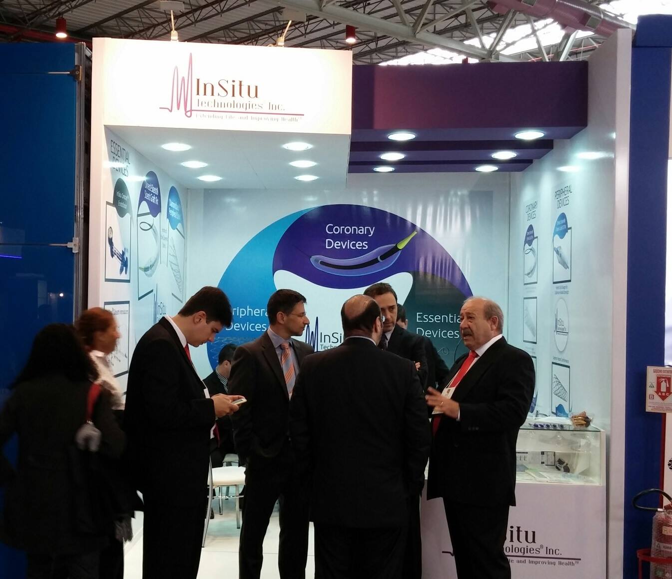 InSitu Technologies team meeting visitors at a medical-device exhibition